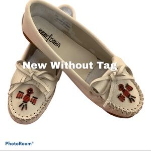 Brand new. NWOT.  Minnetonka Mocs